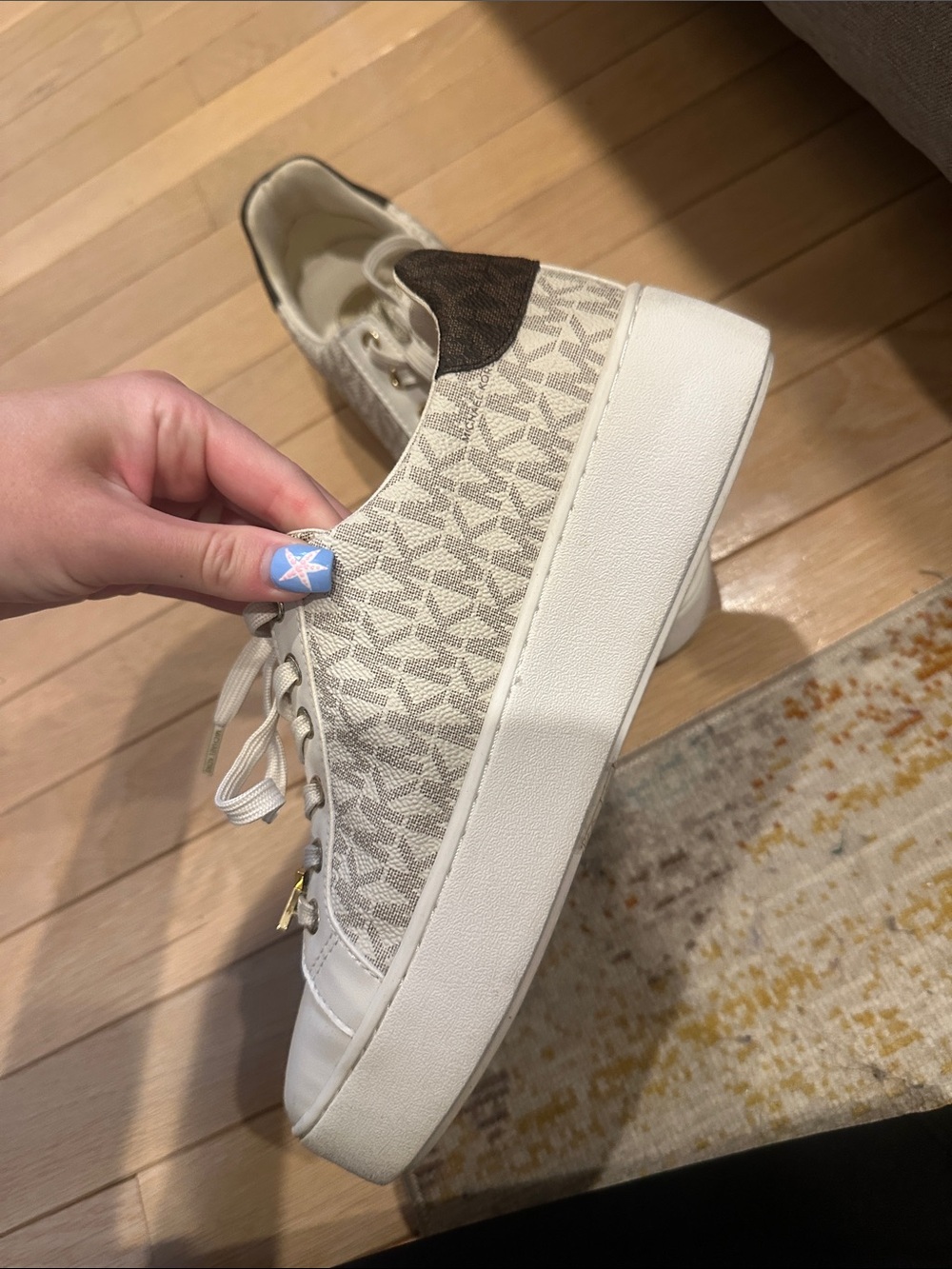 Michael Kors Cream and Gold MK Logo Low-Top Sneakers - Picture 4 of 12